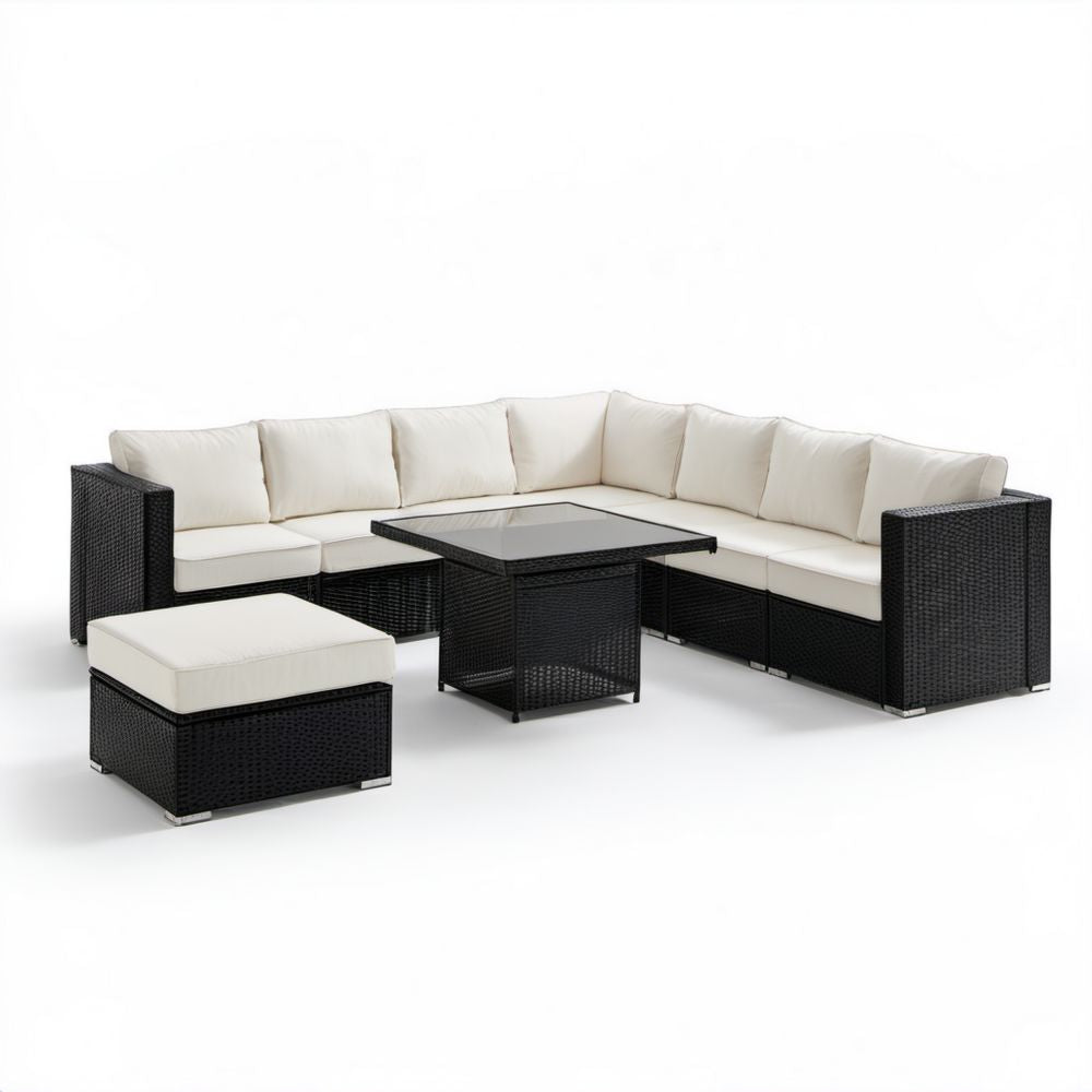 Ogrodowy zestaw mebli rattanowych PE: sofa narożna 230 × 180 cm, stolik ze szkłem i pufa, czarny/kremowy